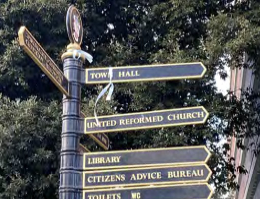 Finger post pointing to different places in Brentwood town centre