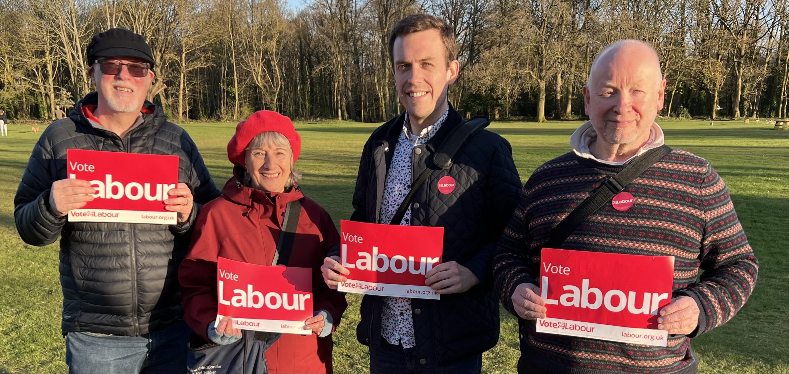 four Labour campaigners holding placards