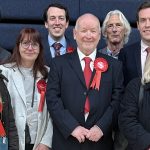 Labour supporters standing in a formal photograph