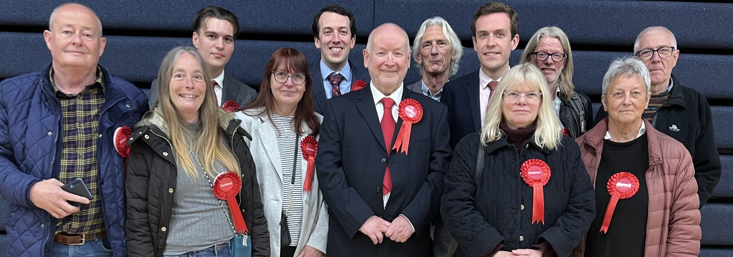 Labour supporters standing in a formal photograph