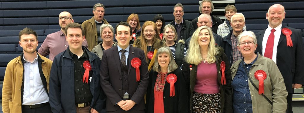 A large group of campaigners in a formal team photo