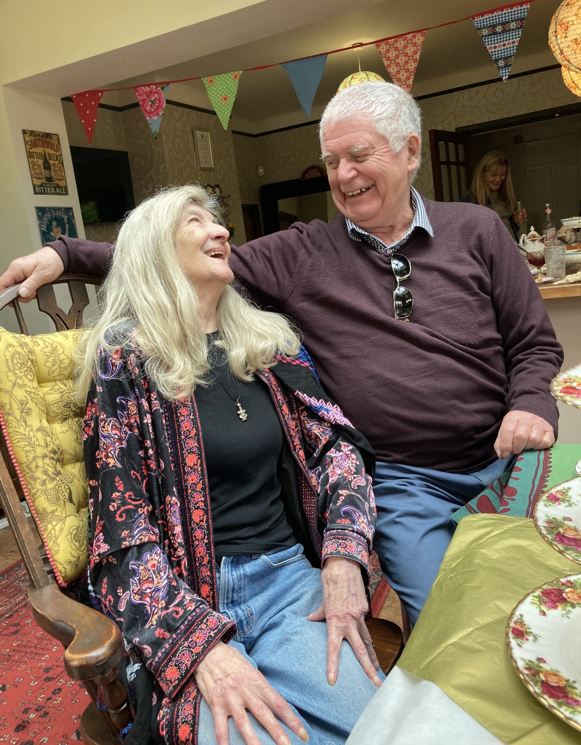 June Simmons and Ron Huish looking at each other